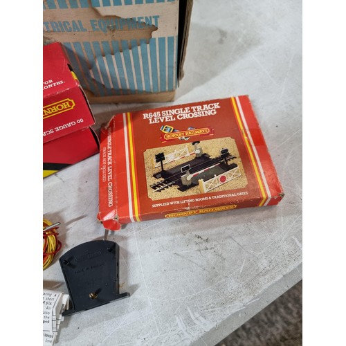 112 - Box containing a large quantity of model train 00 gauge  accesories inc a large quantity of track, s... 