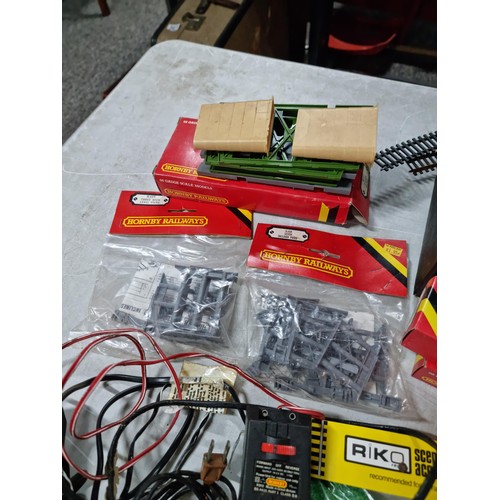 112 - Box containing a large quantity of model train 00 gauge  accesories inc a large quantity of track, s... 