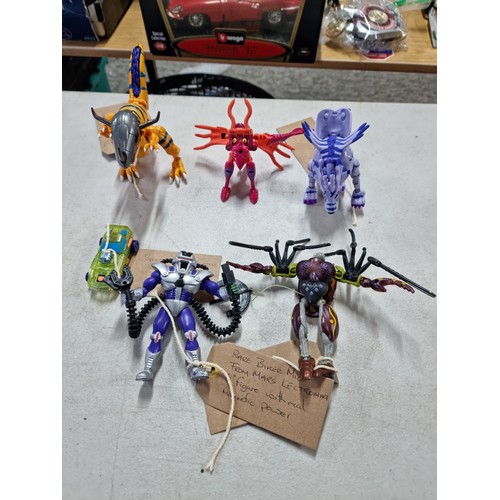 95 - A quantity of various collectable vintage action figures, some having a transforming action, to incl... 