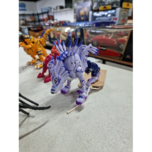 95 - A quantity of various collectable vintage action figures, some having a transforming action, to incl... 