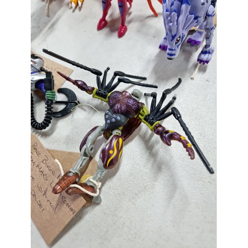 95 - A quantity of various collectable vintage action figures, some having a transforming action, to incl... 