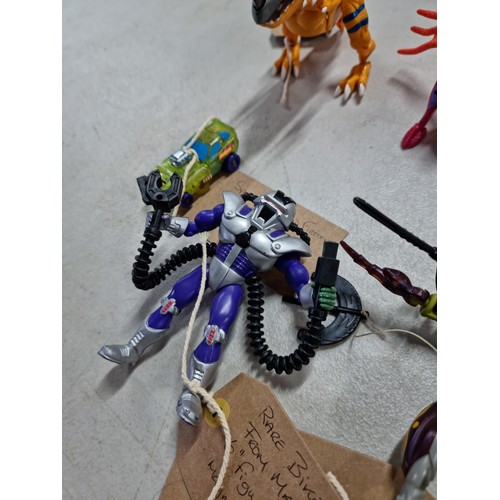 95 - A quantity of various collectable vintage action figures, some having a transforming action, to incl... 