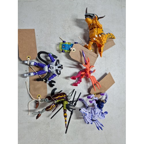 95 - A quantity of various collectable vintage action figures, some having a transforming action, to incl... 