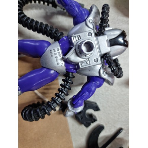 95 - A quantity of various collectable vintage action figures, some having a transforming action, to incl... 