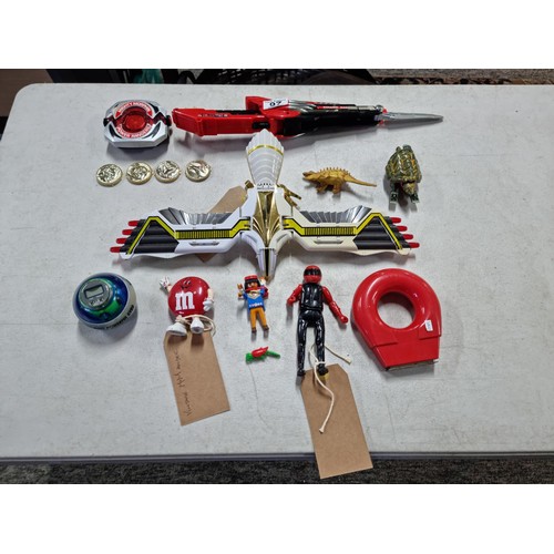 97 - A collection of vintage collectable action figures and accessories to include a rare collectable Pow... 