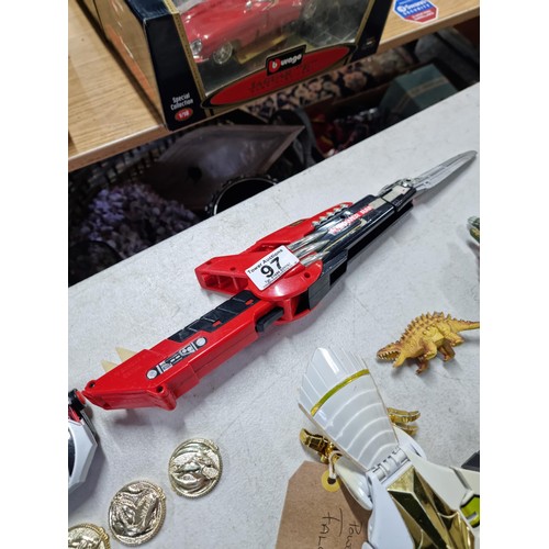 97 - A collection of vintage collectable action figures and accessories to include a rare collectable Pow... 