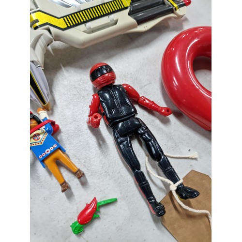 97 - A collection of vintage collectable action figures and accessories to include a rare collectable Pow... 