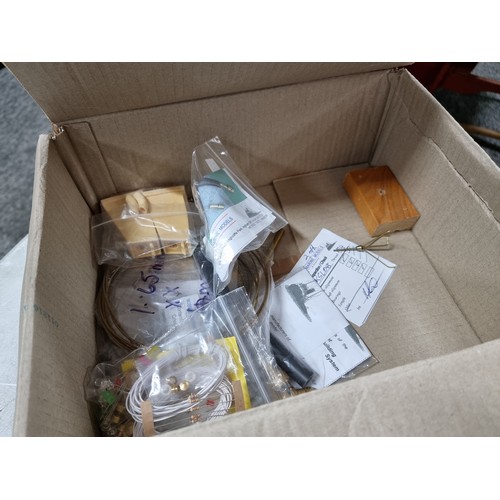 109 - Box containing a large quantity of model accessories possibly for a boat inc a selection of small mo... 