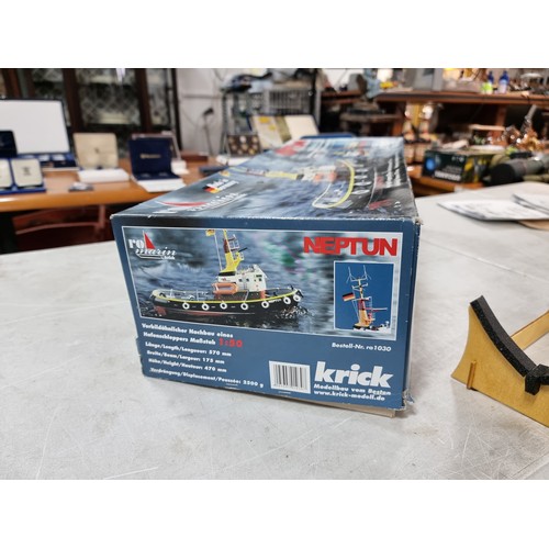 110 - Boxed Neptune model tug boat partially complete, with a quantity of parts and a controller, cannot g... 