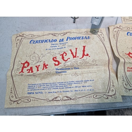 65 - Boxed tin plate reproduction of a clock work plane with fold back wings, based on a plane from 1927,... 