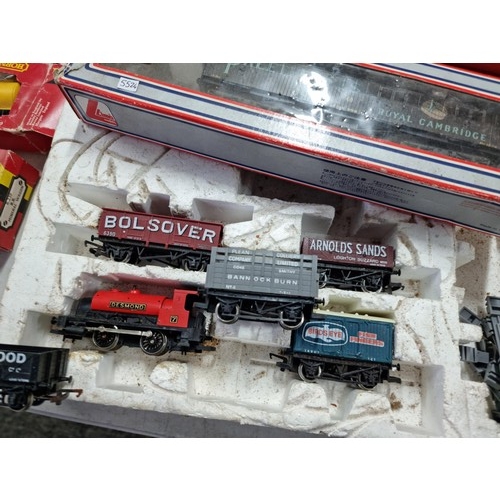 93 - Quantity of Hornby boxed train items inc a partially complete Hornby Junior electric train set, boxe... 