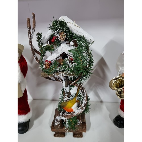 4 - 3x Christmas items inc a dancing Father Christmas with a saxophone along with a tall Father Christma... 