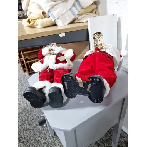 4 - 3x Christmas items inc a dancing Father Christmas with a saxophone along with a tall Father Christma... 