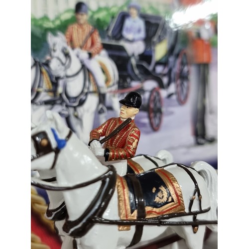 10 - Boxed Britains collectors club, Trooping of the colour Her majesty in the ivory mounted Phaeton, con... 