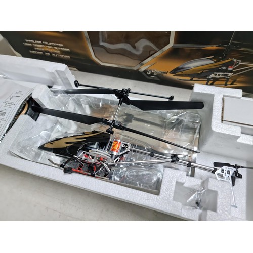 71 - A boxed as new Attop Toys remote control model helicopter Alloy Falcon, a wire less helicopter used ... 