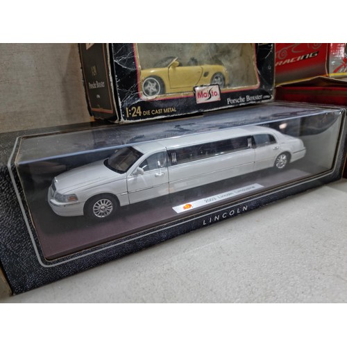 73 - A selection of 4x large scale boxed diecast cars to include a Sunnyside 2003 Lincoln limousine, a Me... 