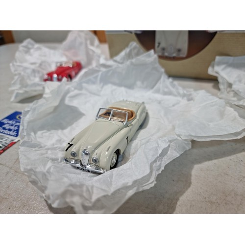 80 - A brand new Corgi 97706 Jaguar XK120 3 car racing set in red white and blue, limited edition with CO... 