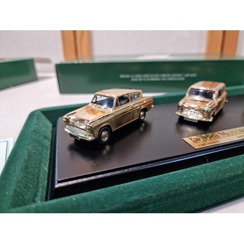 82 - An impressive limited edition gold plated 3 car sets on plinths by Lledo which includes British moto... 