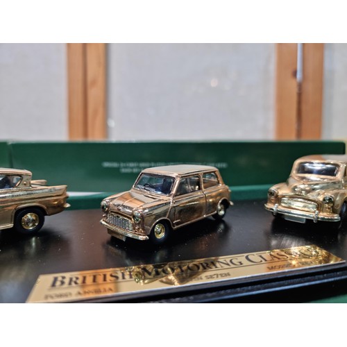 82 - An impressive limited edition gold plated 3 car sets on plinths by Lledo which includes British moto... 