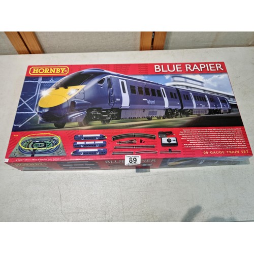 89 - A boxed as new Hornby R1139 Blue Rapier train set featuring a Hitachi clasp 395 three car set, oval ... 