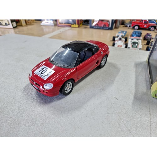 105 - A large collection of 21x Corgi model diecast cars and vehicles to include a collection of Formula 1... 