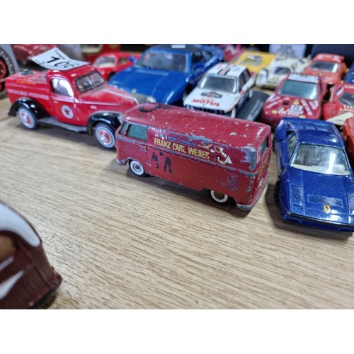 106 - A large collection of 18x various diecast model cars, mostly of racing sports cars by various makers... 