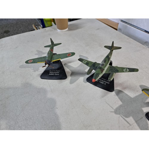 122 - A collection of 5x Atlas editions diecast model planes on plinths from the WWII period, 1 plane need... 