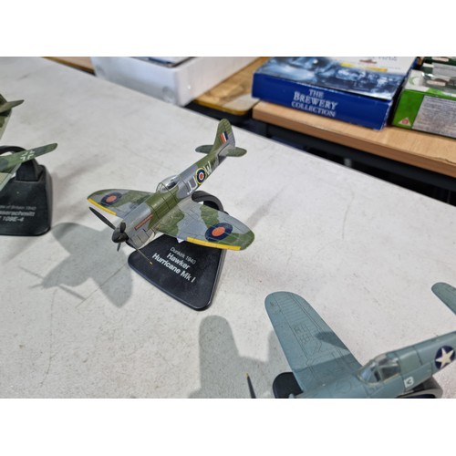 122 - A collection of 5x Atlas editions diecast model planes on plinths from the WWII period, 1 plane need... 