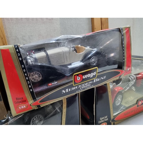 65 - A collection of 4x large scale diecast model cars to include 3x as new boxed Burago diecast vintage ... 