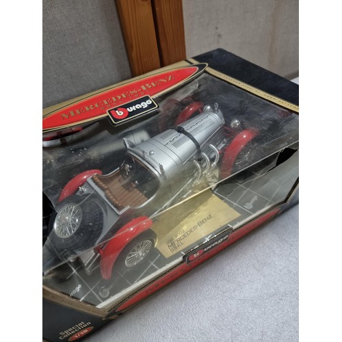 65 - A collection of 4x large scale diecast model cars to include 3x as new boxed Burago diecast vintage ... 