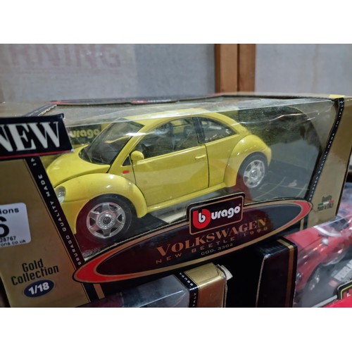 66 - A collection of 4x as new boxed Burago large scale diecast model cars, 3 are 1:18 1 is 1:24 scale, i... 