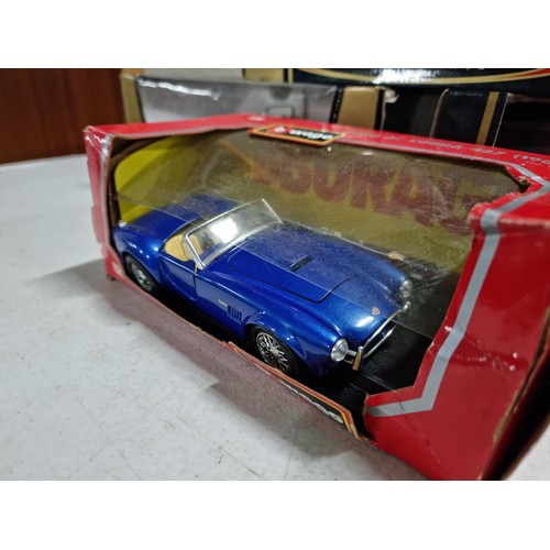 66 - A collection of 4x as new boxed Burago large scale diecast model cars, 3 are 1:18 1 is 1:24 scale, i... 