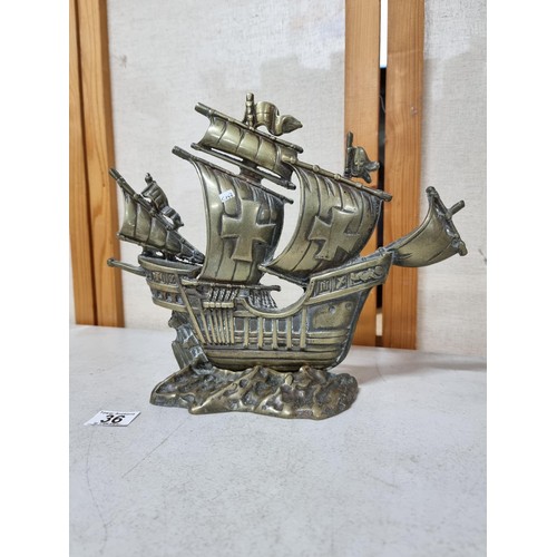 36 - 2 good quality solid brass items to include a vintage galleon ship figure showing good intricate det... 