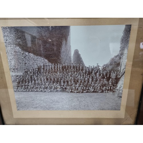 42 - 2x framed and glazed large photographs of British military regiment squads standing outside a castle... 