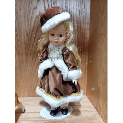 51 - An ornate Santa Claus figure holding a lantern along with a similar Mrs Claus and 2 vintage early pl... 