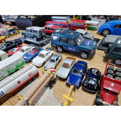 104 - A large collection of approx 42 diecast model vehicles of various makes which includes a collection ... 