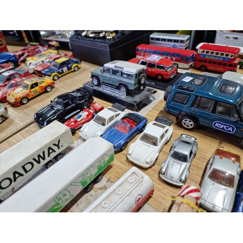 104 - A large collection of approx 42 diecast model vehicles of various makes which includes a collection ... 