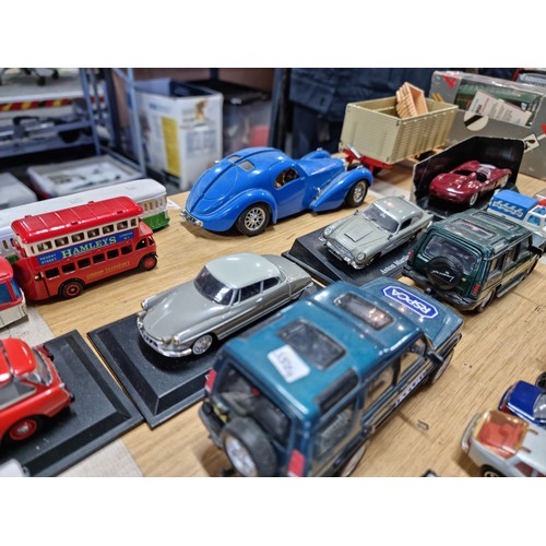 104 - A large collection of approx 42 diecast model vehicles of various makes which includes a collection ... 