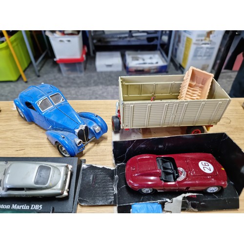 104 - A large collection of approx 42 diecast model vehicles of various makes which includes a collection ... 