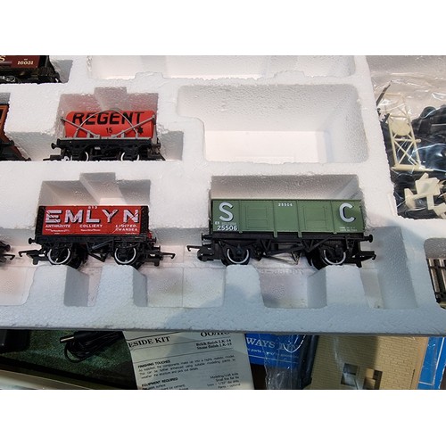 90 - Large 3ft x 4ft board layout with a single loop 00 gauge Hornby track along with a boxed Midland Bel... 