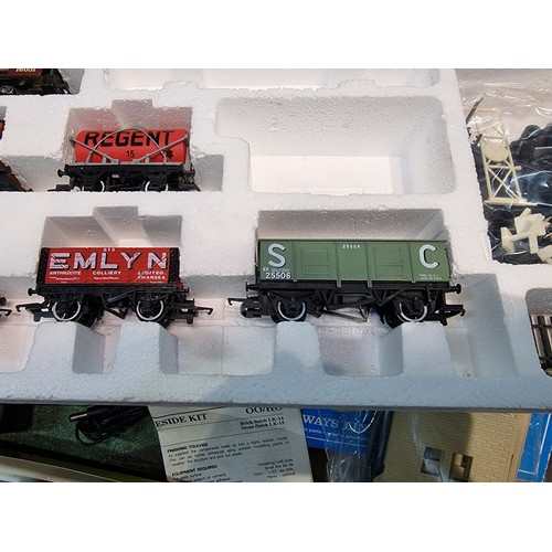 90 - Large 3ft x 4ft board layout with a single loop 00 gauge Hornby track along with a boxed Midland Bel... 