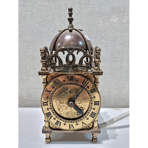 18 - A good quality vintage brass lantern clock by Smiths with a Smiths electrical movement, complete wit... 