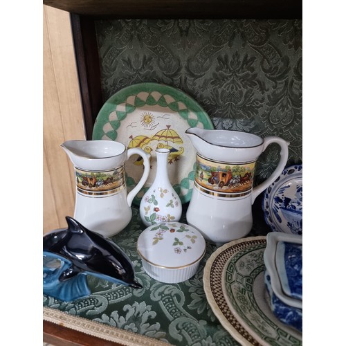 3 - A shelf full of collectable ceramics including a good unusual studio pottery glazed terracotta plate... 