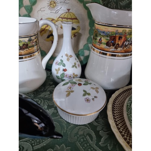 3 - A shelf full of collectable ceramics including a good unusual studio pottery glazed terracotta plate... 