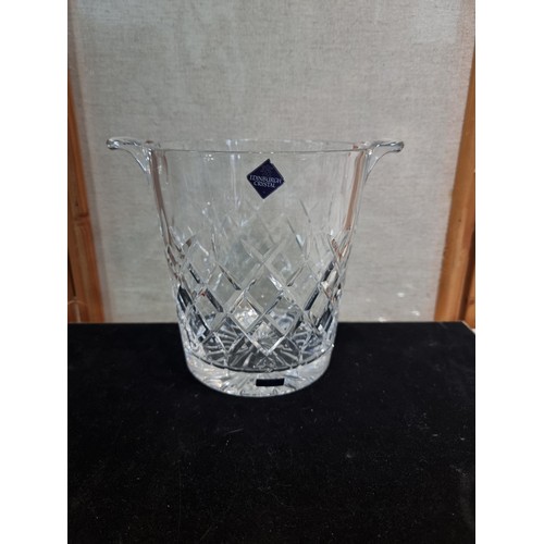 4 - A collection of cut glass crystal pieces including an Edinburgh crystal champagne bucket, a Royal ro... 