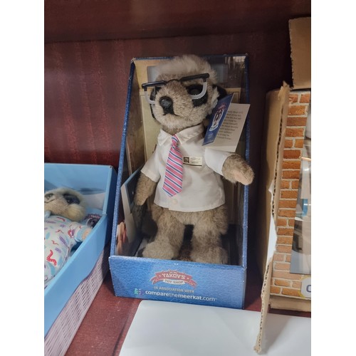 16 - A collection of 7 Compare the Meerkat boxed plush collectable toys including the Star Wars limited B... 