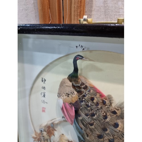 38 - 2 ornate oriental shadow boxes, both with bird designs, 1 depicting a pair of egrets and 1 depicting... 