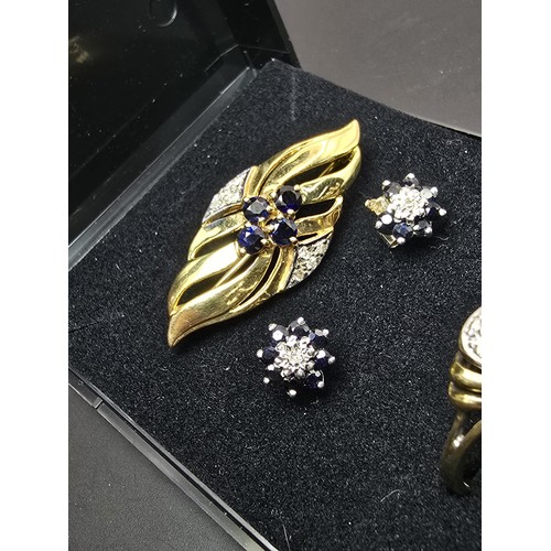 286 - A stunning 9ct yellow gold matching diamond and sapphire jewellery set featuring a brooch with a pie... 