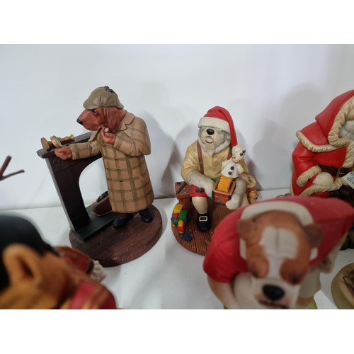 52 - A collection of 7 dog formed novelty figurines Doggie People including a Welsh Corgi Royal groom, a ... 