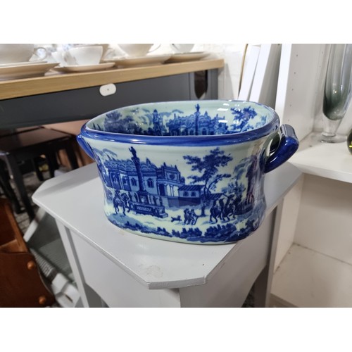 53 - A quantity of collectables including an Ironstone blue and white foot bath along with a selection of... 